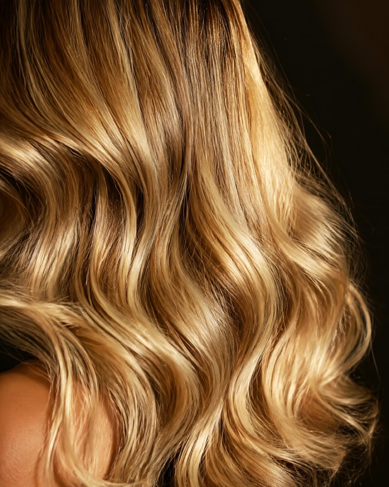 Luminous dimensional blonde hair by Rema Hair in Orlando