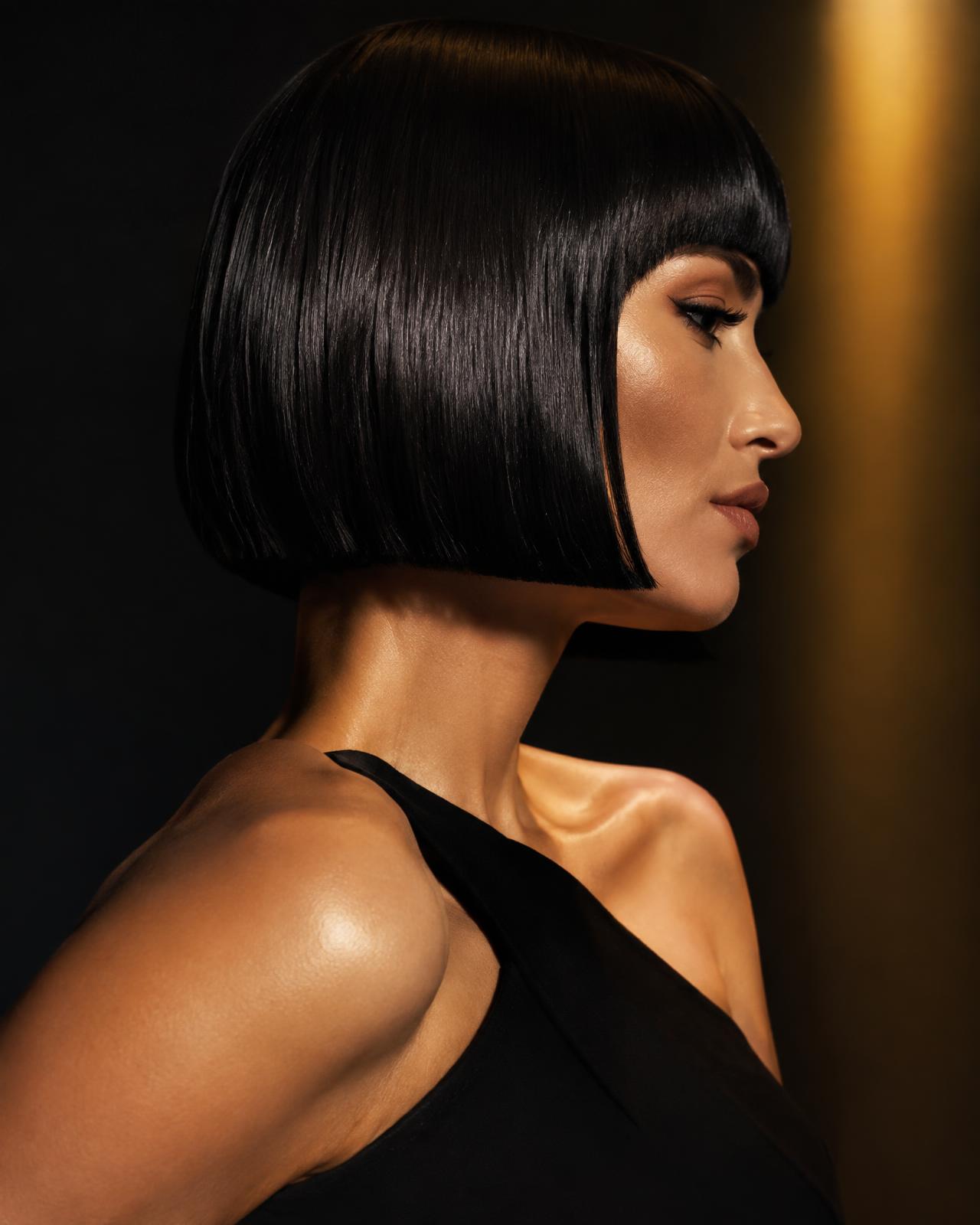 Glossy dimensional hair color by Rema Hair in Orlando
